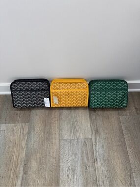 Goyard Trio Pouches in Black, Yellow, and Green